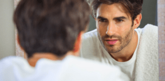 Blindspots: We’re Bad Judges of Ourselves and Our Growth. Really Bad. man looking in a mirror